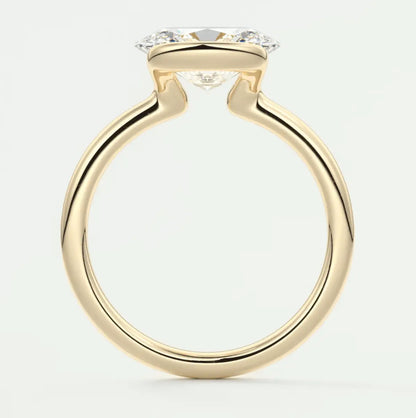 18k yellow gold engagement ring with a princess cut diamond.