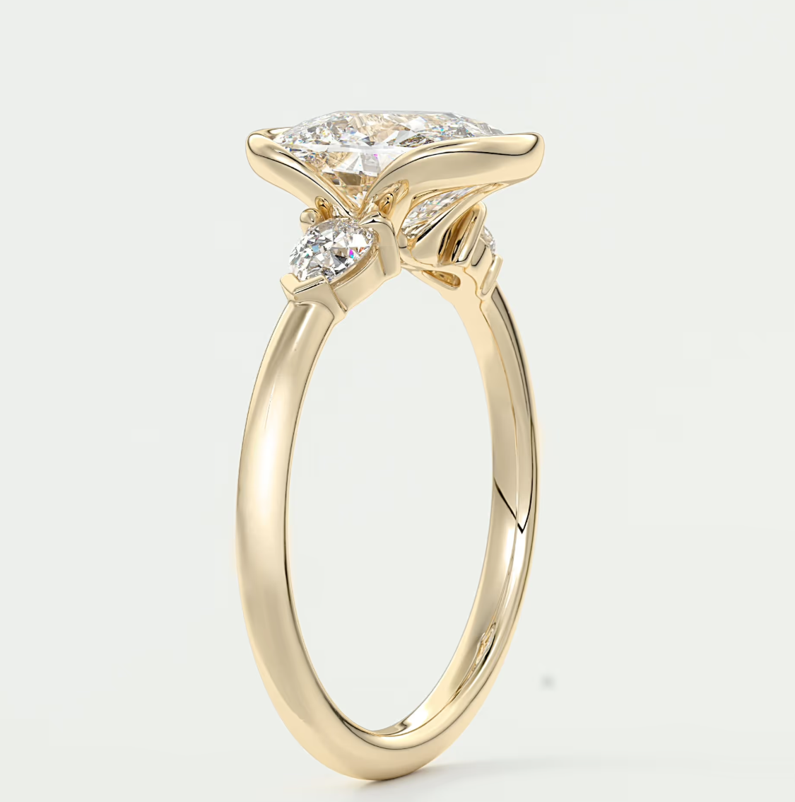 Custom made solara elongated cushion half bezel three-stone engagement ring | diamond lab