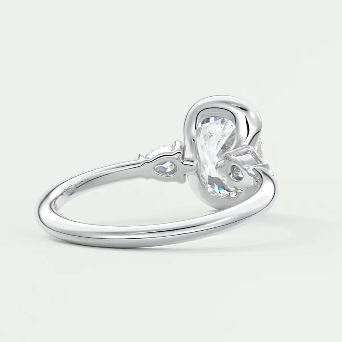 Custom made solara elongated cushion half bezel three-stone engagement ring | diamond lab