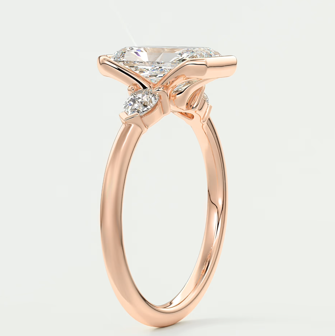 Custom made solara elongated radiant half bezel three-stone engagement ring | diamond lab