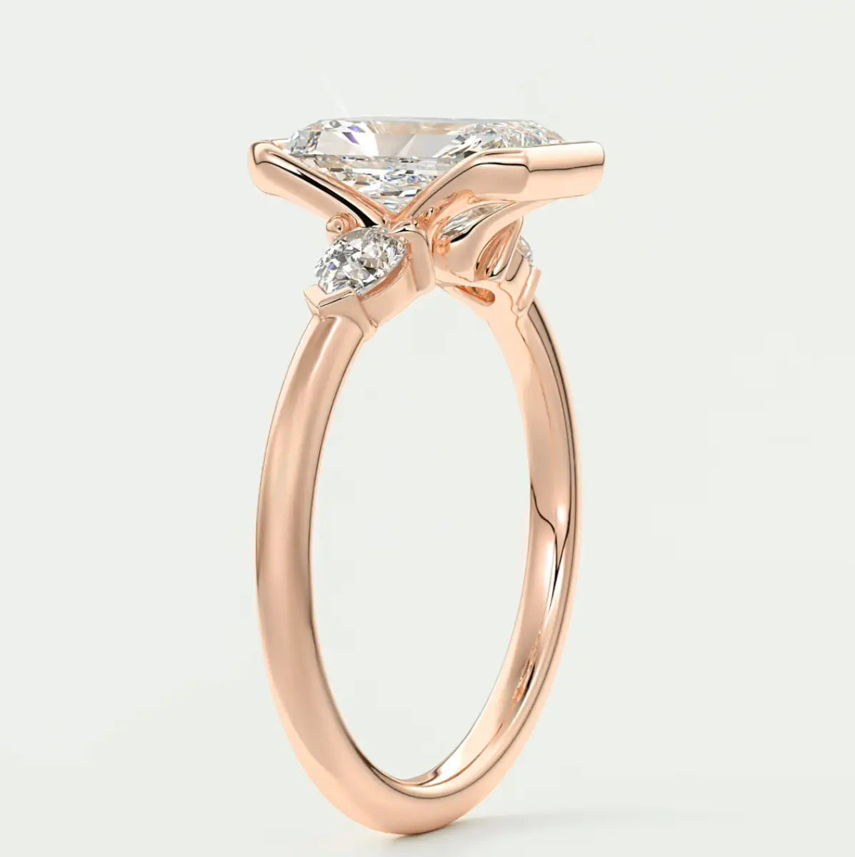 Custom made solara elongated radiant half bezel three-stone engagement ring | diamond lab