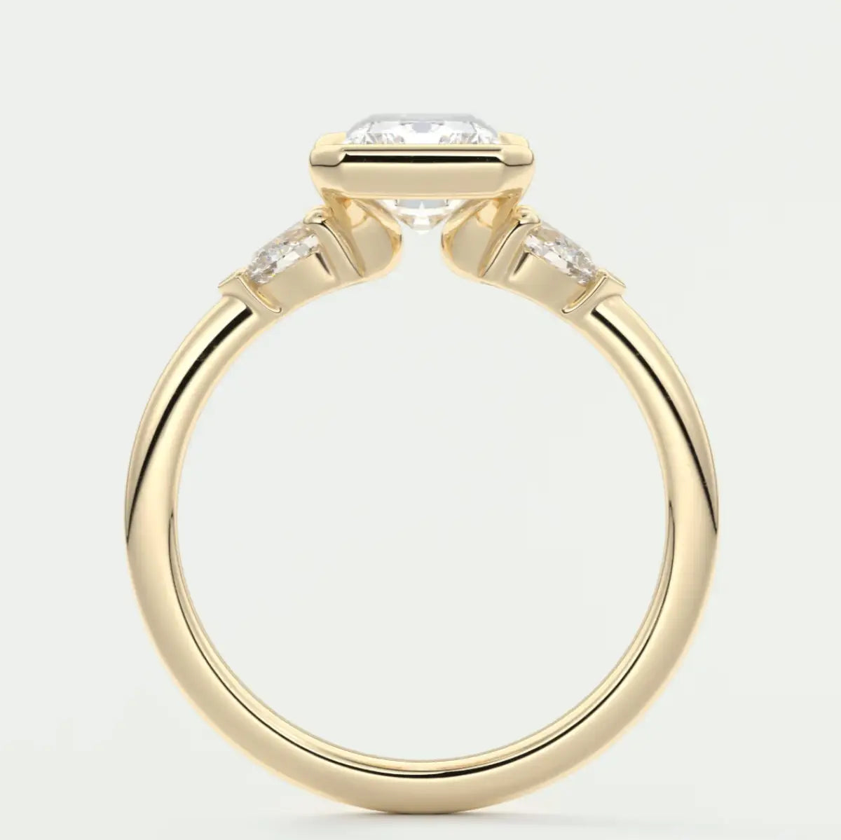 Custom made solara elongated radiant half bezel three-stone engagement ring | diamond lab