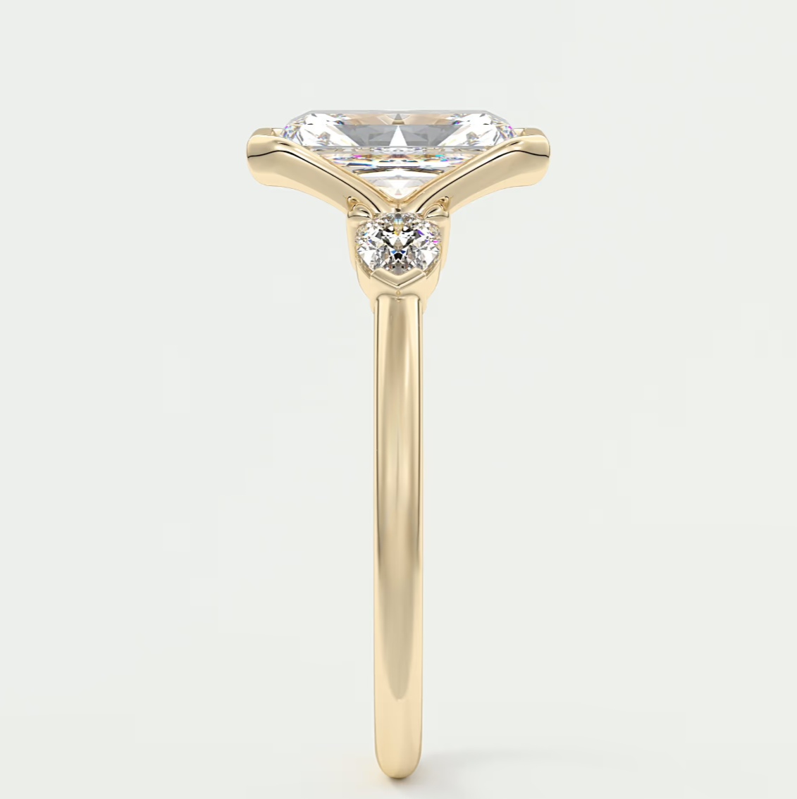 Custom made solara elongated radiant half bezel three-stone engagement ring | diamond lab