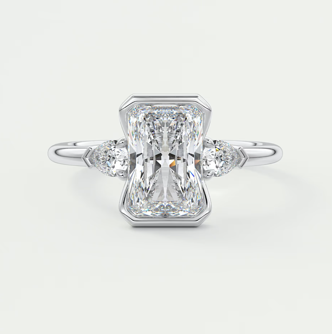 Custom made solara elongated radiant half bezel three-stone engagement ring | diamond lab