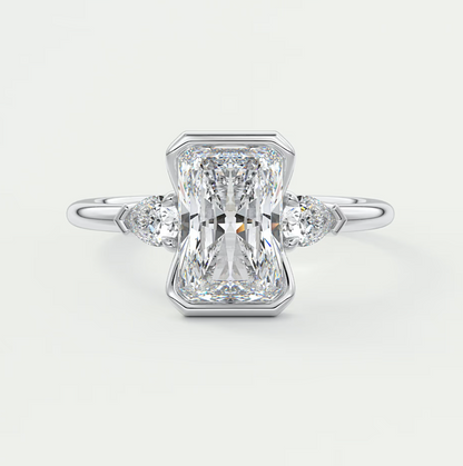 Custom made solara elongated radiant half bezel three-stone engagement ring | diamond lab
