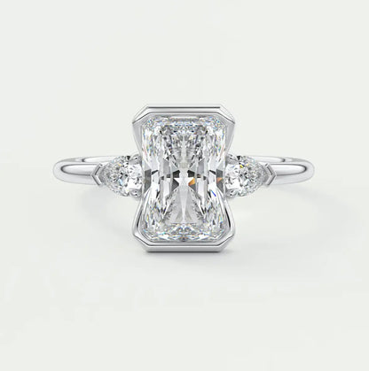 Custom made solara elongated radiant half bezel three-stone engagement ring | diamond lab