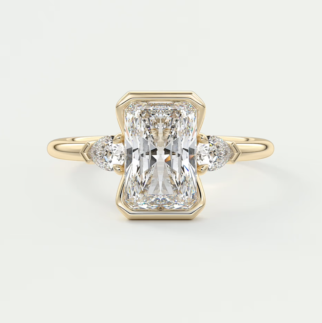 Custom made solara elongated radiant half bezel three-stone engagement ring | diamond lab