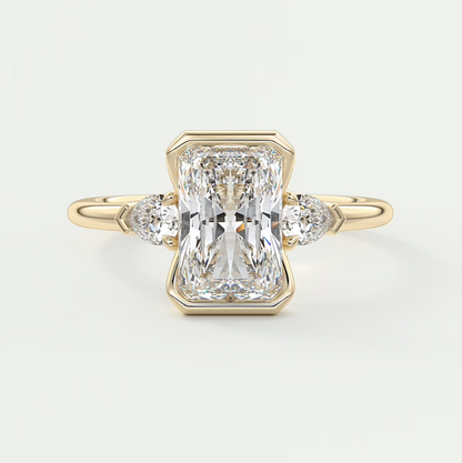 Custom made solara elongated radiant half bezel three-stone engagement ring | diamond lab