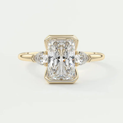 Custom made solara elongated radiant half bezel three-stone engagement ring | diamond lab