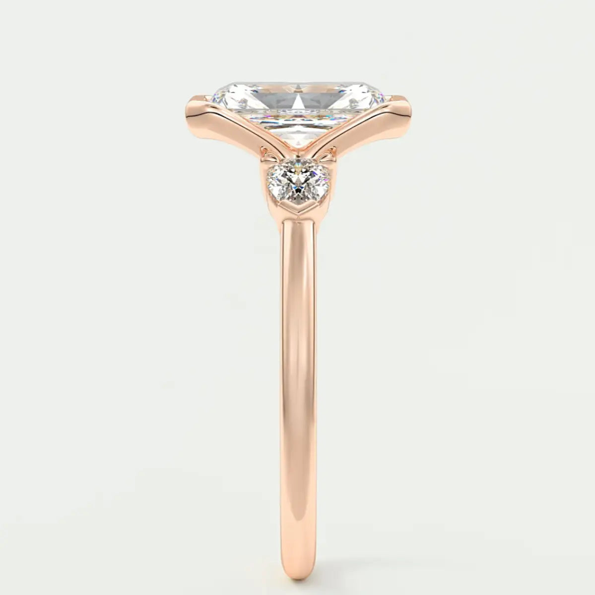 Custom made solara elongated radiant half bezel three-stone engagement ring | diamond lab