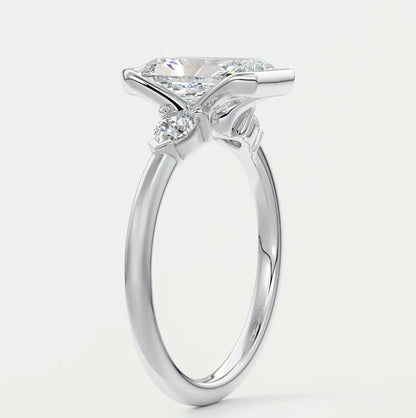 Custom made solara elongated radiant half bezel three-stone engagement ring | diamond lab