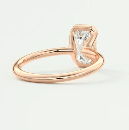 18k rose gold engagement ring with a princess cut diamond.