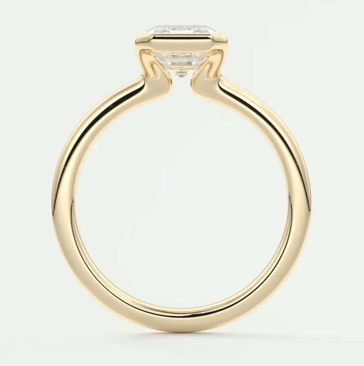 18k yellow gold engagement ring with a princess cut diamond.