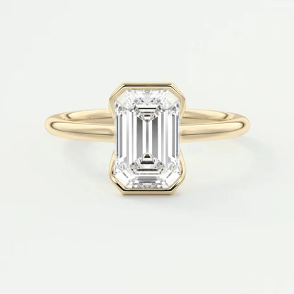 18k yellow gold emerald cut diamond engagement ring.