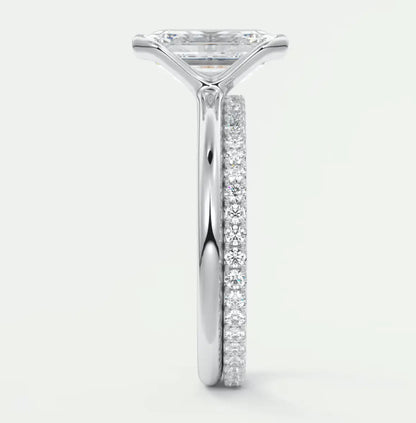 18k white gold princess cut diamond engagement ring with a pave band.