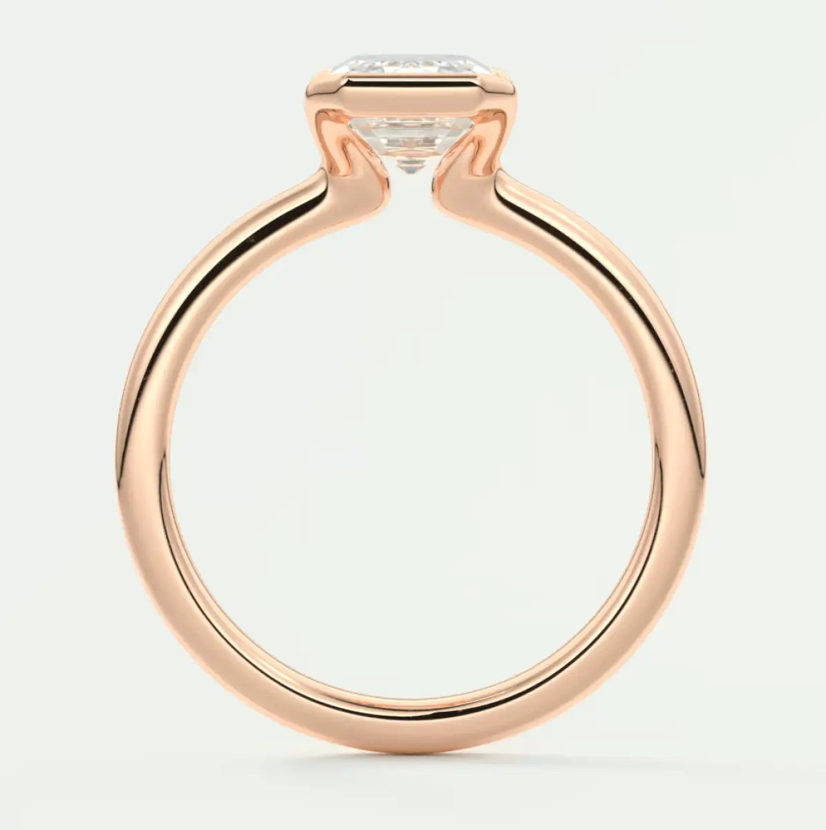 18k rose gold engagement ring with a princess cut diamond.