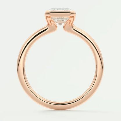 18k rose gold engagement ring with a princess cut diamond.