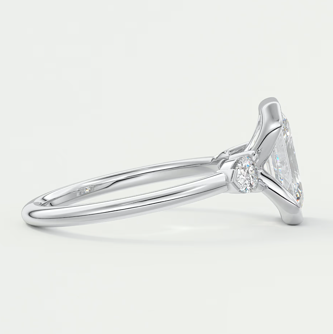 Custom made solara emerald half bezel three-stone engagement ring | diamond lab