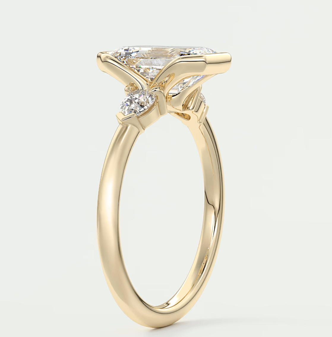 Custom made solara emerald half bezel three-stone engagement ring | diamond lab