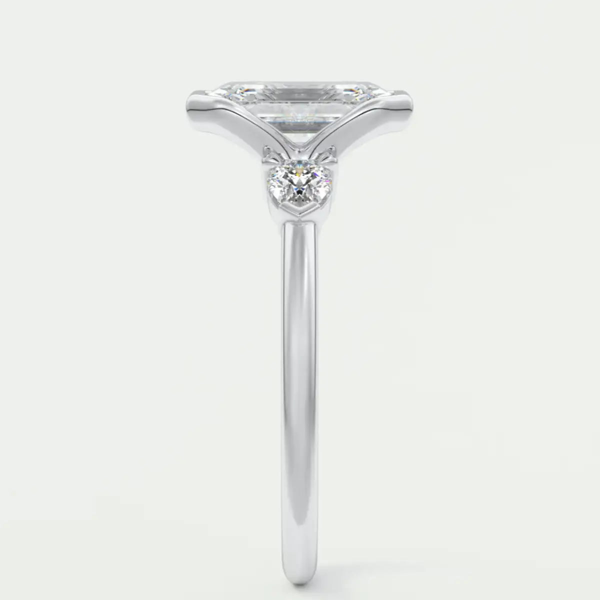 Custom made solara emerald half bezel three-stone engagement ring | diamond lab