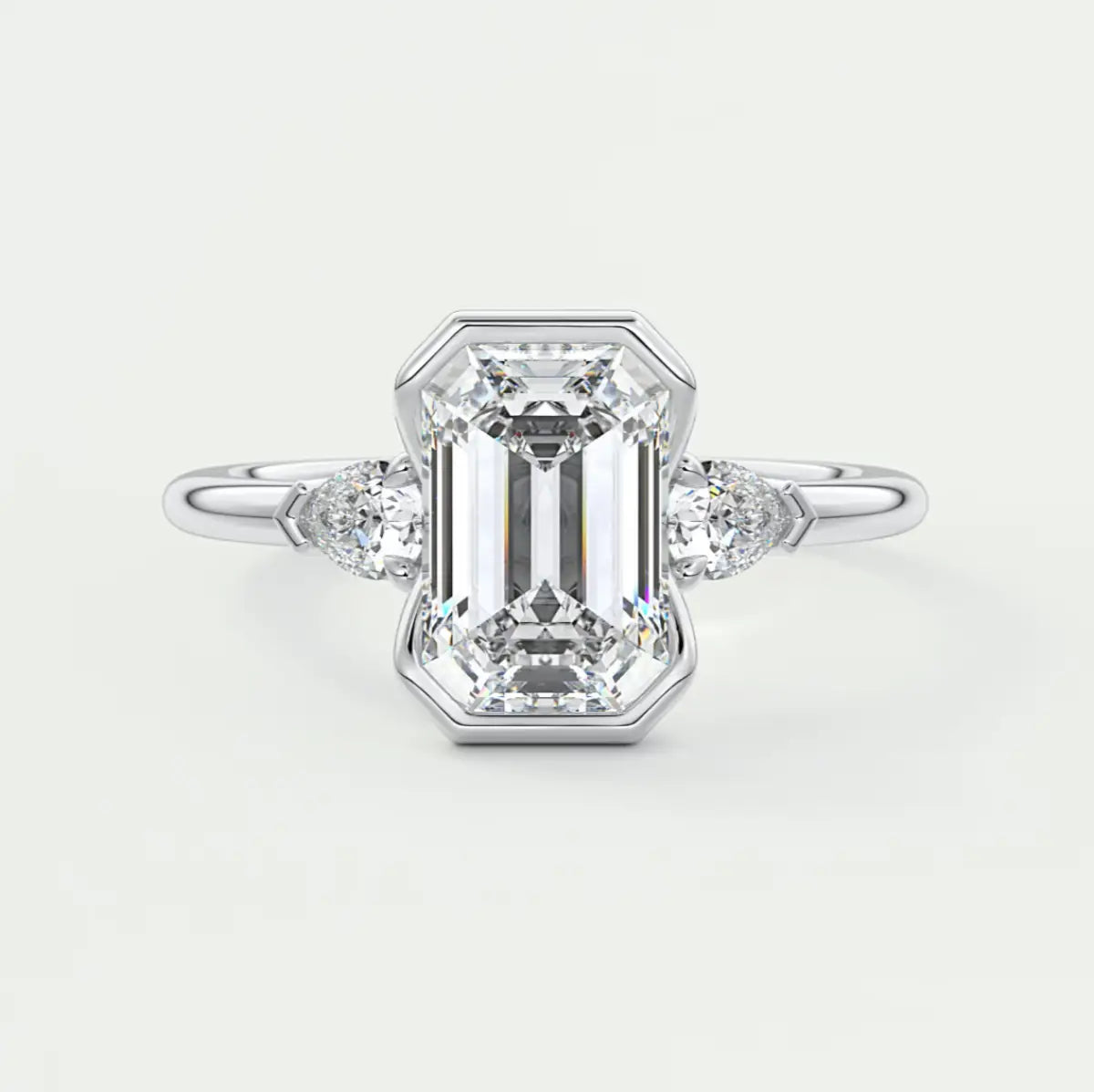 Custom made solara emerald half bezel three-stone engagement ring | diamond lab