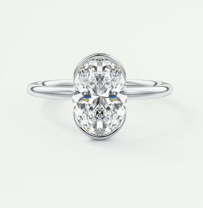 18k white gold oval diamond engagement ring with a halo setting.