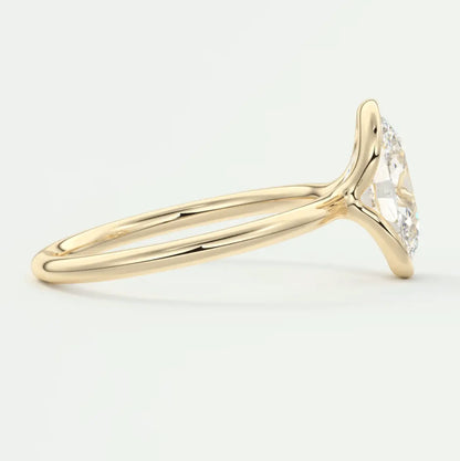 18k yellow gold diamond engagement ring with a halo design.