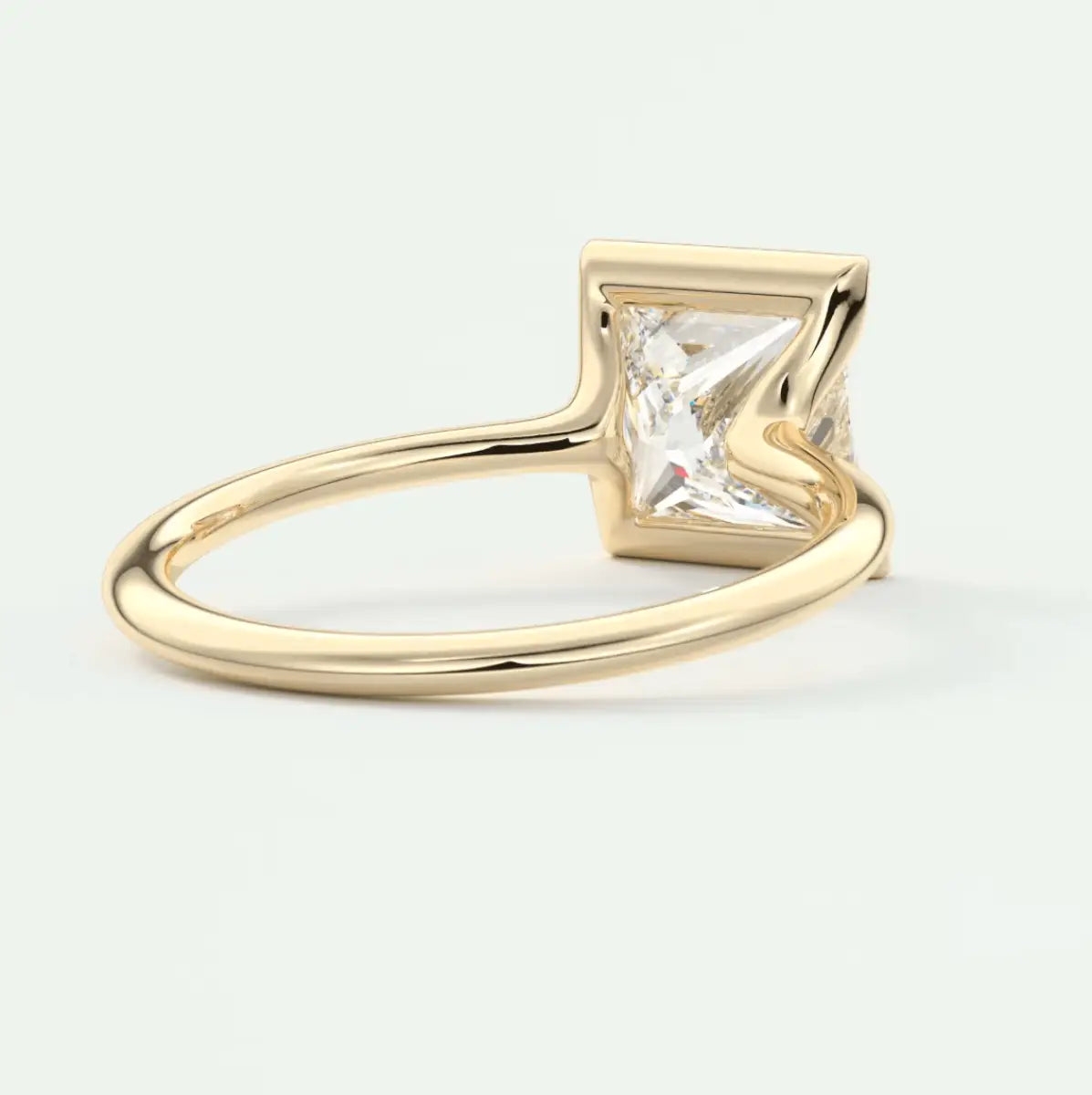 18k gold princess cut diamond engagement ring.