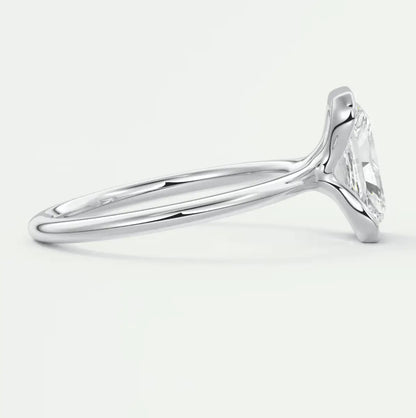 18-karat white gold engagement ring with a princess-cut diamond.