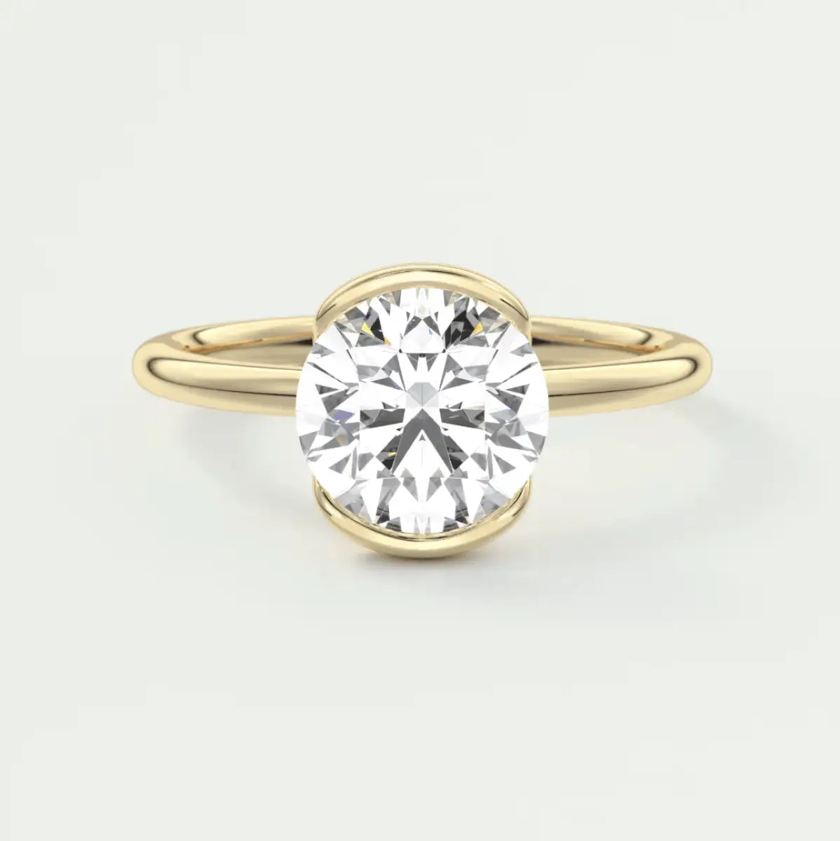 18k yellow gold solitaire diamond engagement ring.