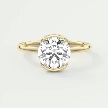18k yellow gold solitaire diamond engagement ring.