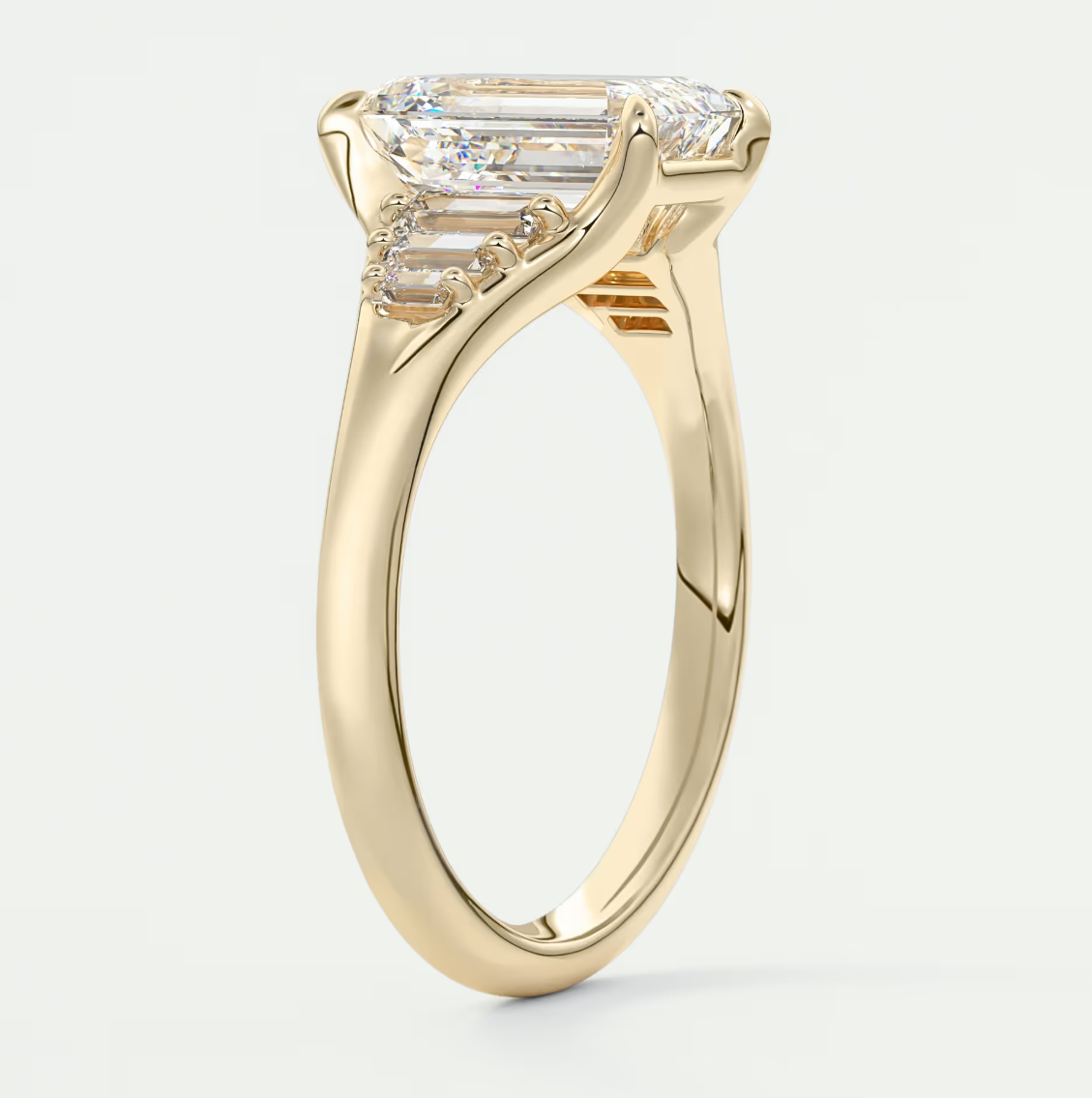 Custom made solena emerald split shank engagement ring with baguette side stones | diamond lab