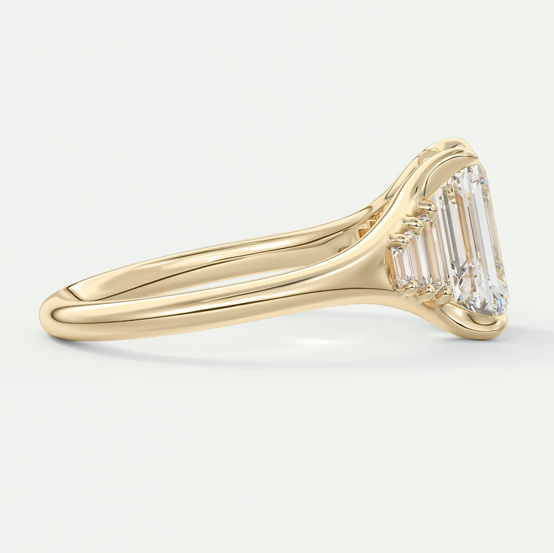 Custom made solena emerald split shank engagement ring with baguette side stones | diamond lab