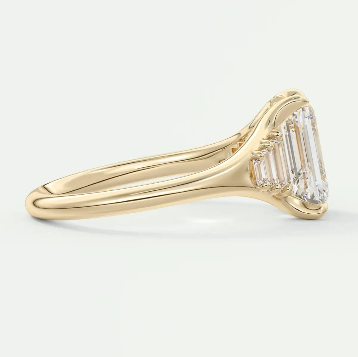 Custom made solena emerald split shank engagement ring with baguette side stones | diamond lab