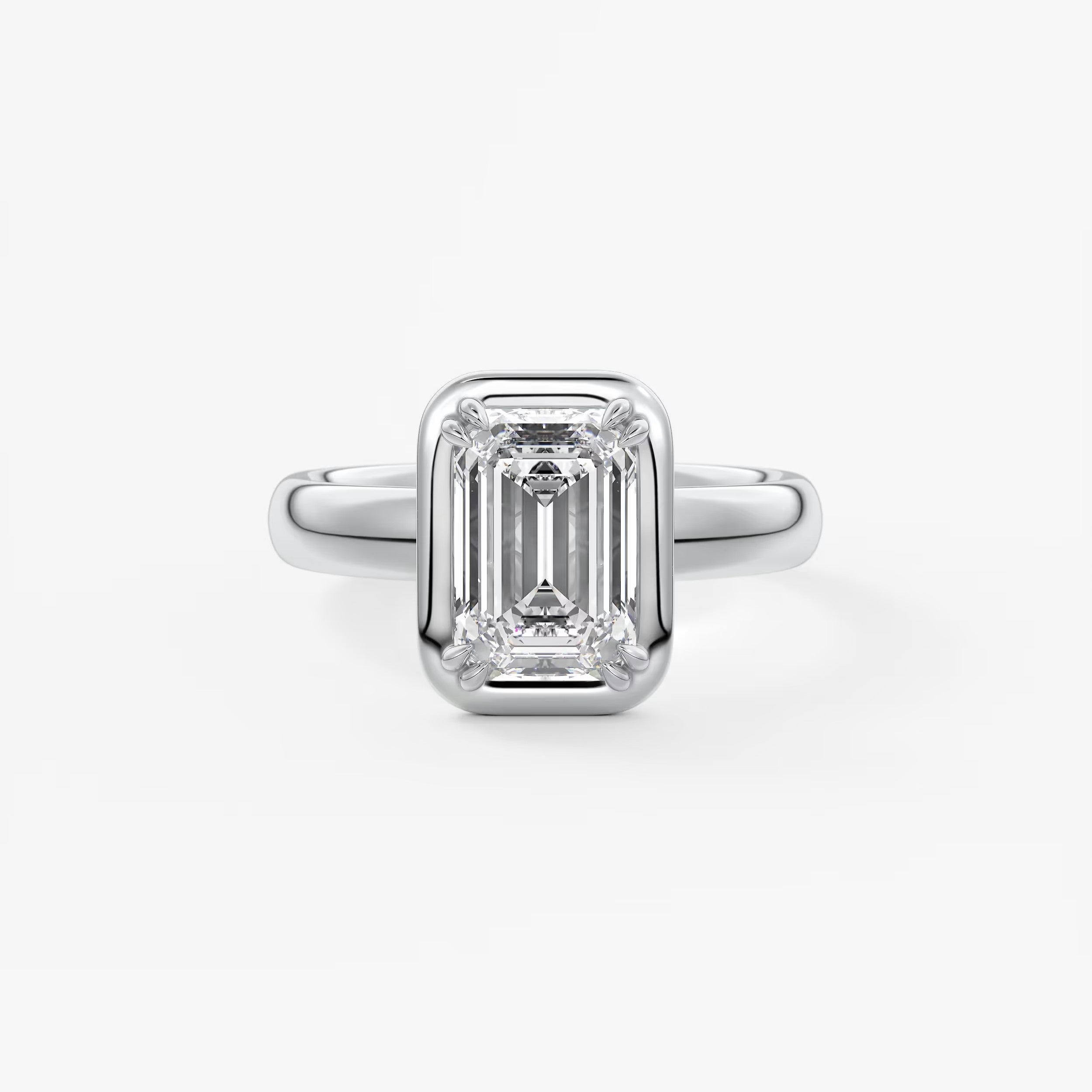 Custom made taylor grande emerald lab diamond bezel engagement ring | australia