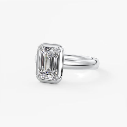 Custom made taylor grande emerald lab diamond bezel engagement ring | australia