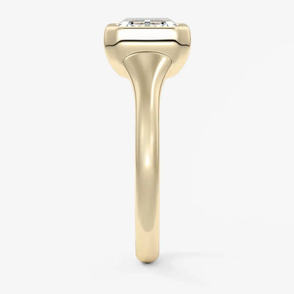 18k yellow gold engagement ring with a square diamond.