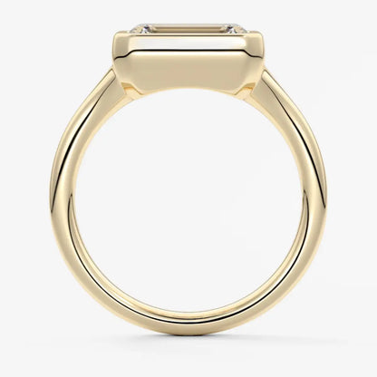 18k yellow gold emerald cut diamond engagement ring.