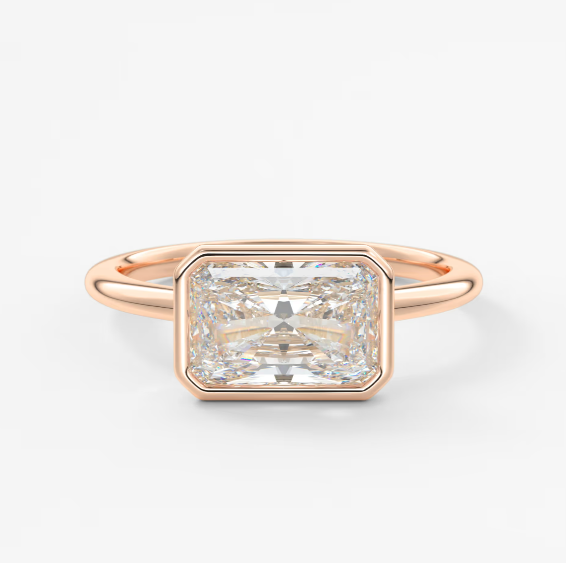 Custom made véda east-west radiant bezel engagement ring | lab diamond or moissanite –