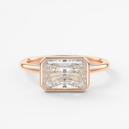 Custom made véda east-west radiant bezel engagement ring | lab diamond or moissanite –