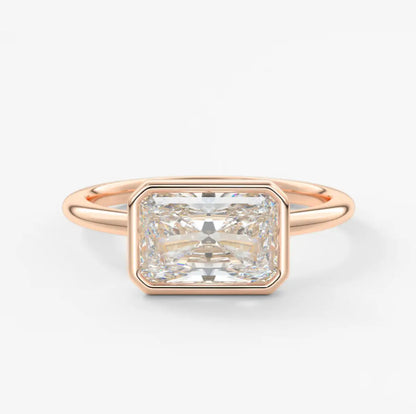 Custom made véda east-west radiant bezel engagement ring | lab diamond or moissanite –