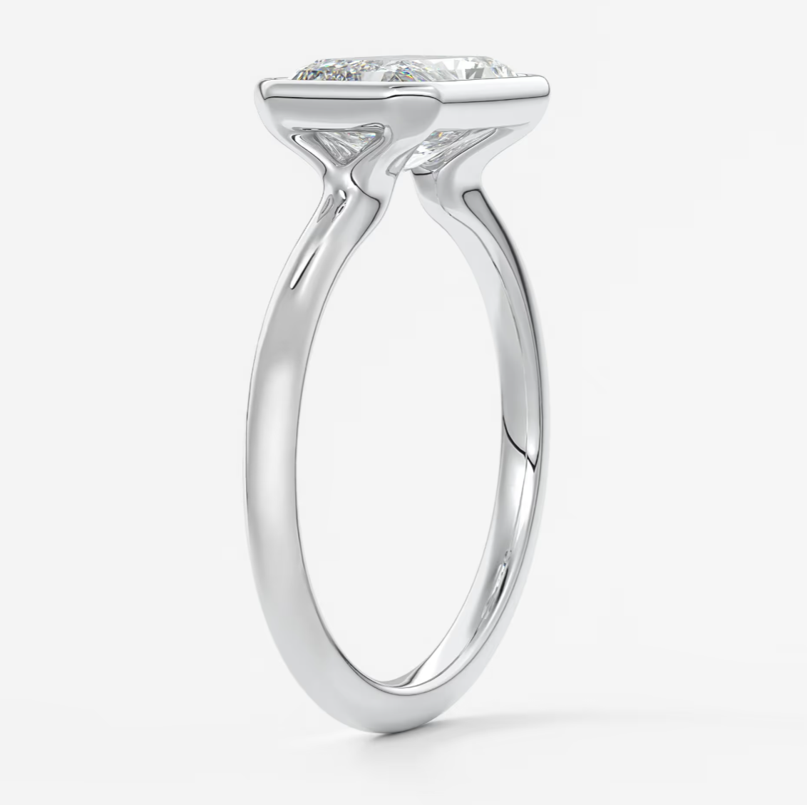 Custom made véda east-west radiant bezel engagement ring | lab diamond or moissanite –