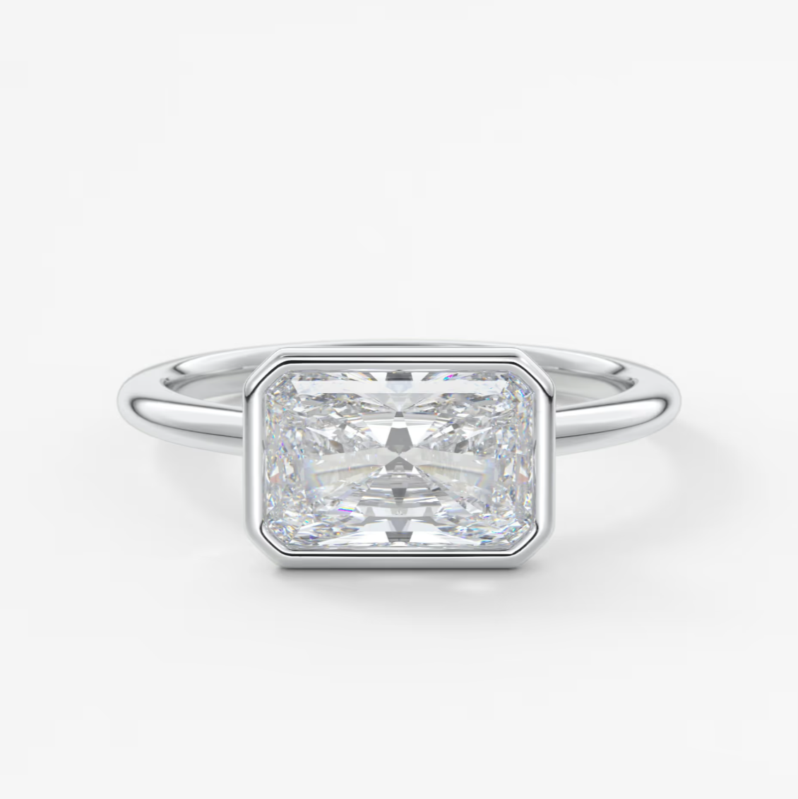 Custom made véda east-west radiant bezel engagement ring | lab diamond or moissanite –