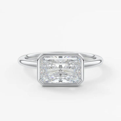 Custom made véda east-west radiant bezel engagement ring | lab diamond or moissanite –