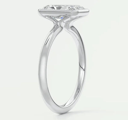 18k white gold engagement ring with a marquise-cut diamond.