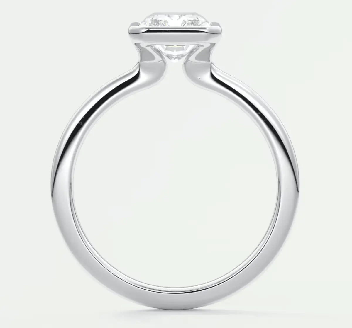 18k white gold engagement ring with a round diamond.